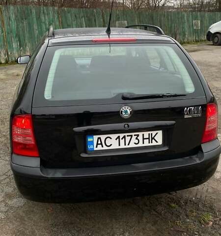 Черный Шкода Октавия, объемом двигателя 1.6 л и пробегом 206 тыс. км за 6300 $, фото 6 на Automoto.ua