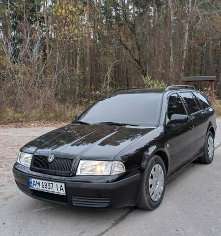 Чорний Шкода Октавія, об'ємом двигуна 1.6 л та пробігом 144 тис. км за 6999 $, фото 1 на Automoto.ua