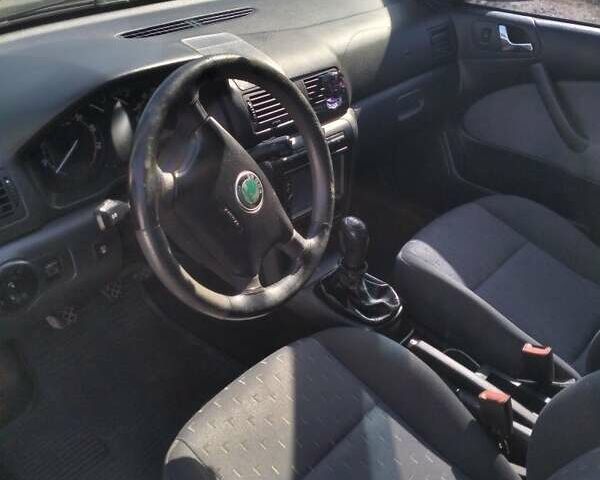 Чорний Шкода Октавія, об'ємом двигуна 1.6 л та пробігом 218 тис. км за 6100 $, фото 7 на Automoto.ua