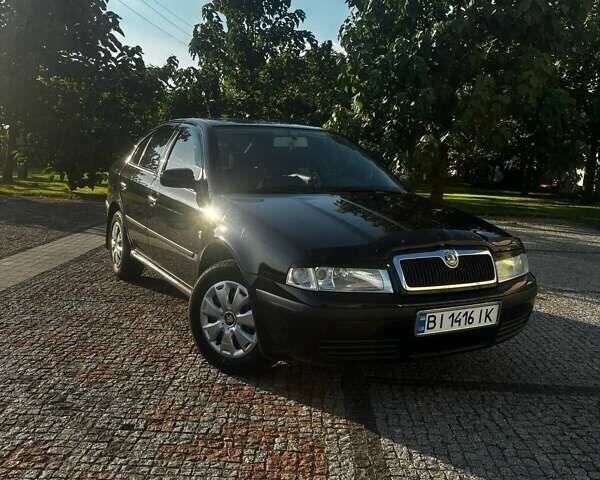 Чорний Шкода Октавія, об'ємом двигуна 1.6 л та пробігом 218 тис. км за 6100 $, фото 11 на Automoto.ua