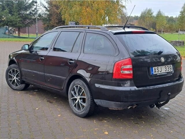 Черный Шкода Октавия, объемом двигателя 2 л и пробегом 215 тыс. км за 1750 $, фото 6 на Automoto.ua