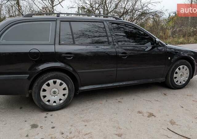 Чорний Шкода Октавія, об'ємом двигуна 1.6 л та пробігом 144 тис. км за 6999 $, фото 8 на Automoto.ua