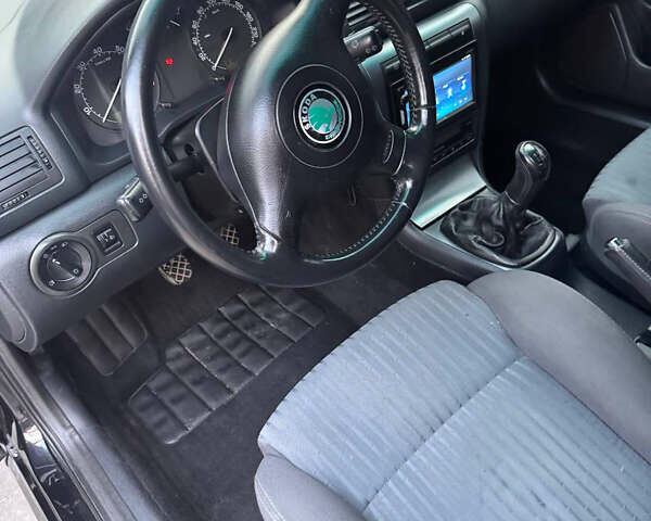 Черный Шкода Октавия, объемом двигателя 1.6 л и пробегом 210 тыс. км за 5500 $, фото 7 на Automoto.ua