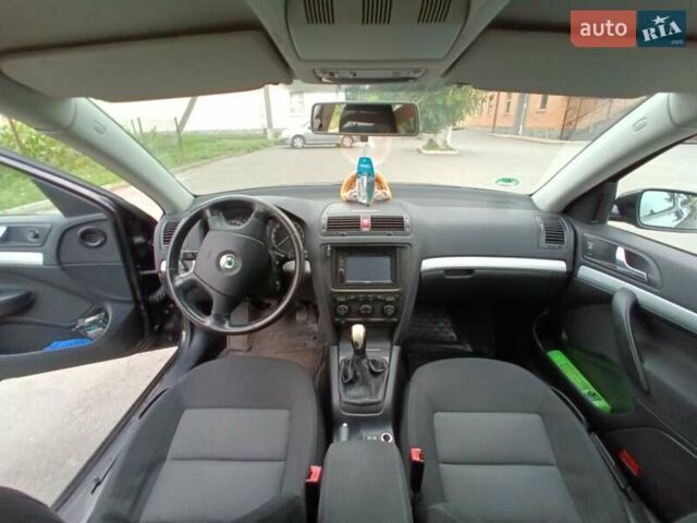Черный Шкода Октавия, объемом двигателя 1.6 л и пробегом 285 тыс. км за 6500 $, фото 6 на Automoto.ua