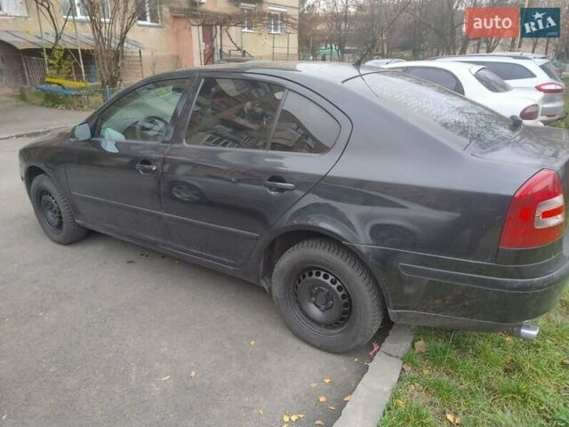 Черный Шкода Октавия, объемом двигателя 1.6 л и пробегом 303 тыс. км за 3900 $, фото 25 на Automoto.ua