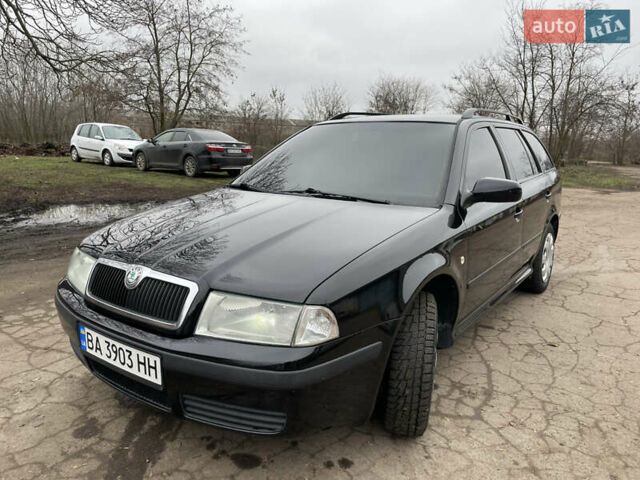 Черный Шкода Октавия, объемом двигателя 1.6 л и пробегом 260 тыс. км за 6100 $, фото 1 на Automoto.ua