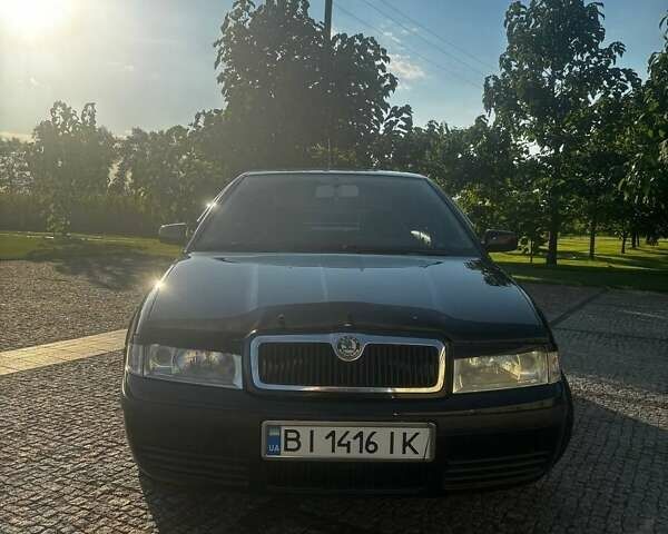 Чорний Шкода Октавія, об'ємом двигуна 1.6 л та пробігом 218 тис. км за 6100 $, фото 2 на Automoto.ua