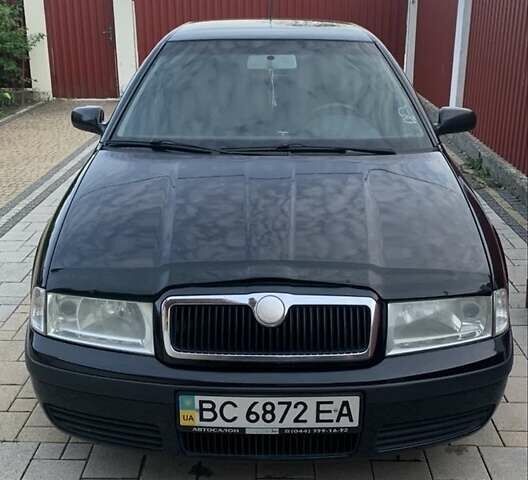 Черный Шкода Октавия, объемом двигателя 1.6 л и пробегом 304 тыс. км за 4600 $, фото 6 на Automoto.ua