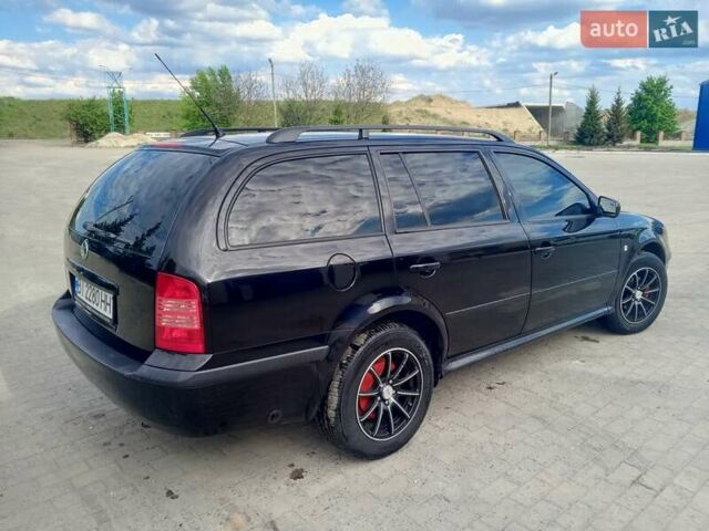 Черный Шкода Октавия, объемом двигателя 1.6 л и пробегом 201 тыс. км за 5800 $, фото 5 на Automoto.ua
