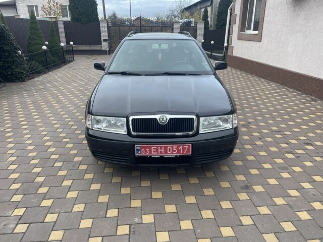 Черный Шкода Октавия, объемом двигателя 1.6 л и пробегом 201 тыс. км за 5900 $, фото 1 на Automoto.ua