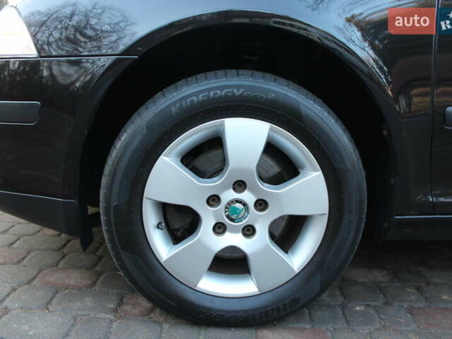 Черный Шкода Октавия, объемом двигателя 1.6 л и пробегом 215 тыс. км за 6390 $, фото 25 на Automoto.ua