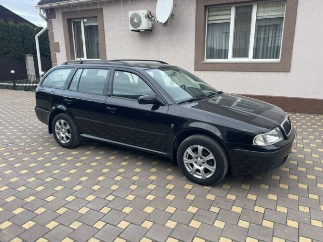 Черный Шкода Октавия, объемом двигателя 1.6 л и пробегом 201 тыс. км за 5900 $, фото 2 на Automoto.ua