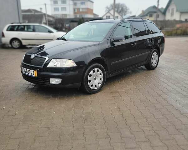 Черный Шкода Октавия, объемом двигателя 1.6 л и пробегом 217 тыс. км за 5900 $, фото 1 на Automoto.ua