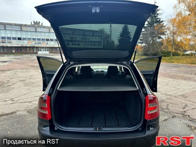 Черный Шкода Октавия, объемом двигателя 2 л и пробегом 270 тыс. км за 6200 $, фото 8 на Automoto.ua