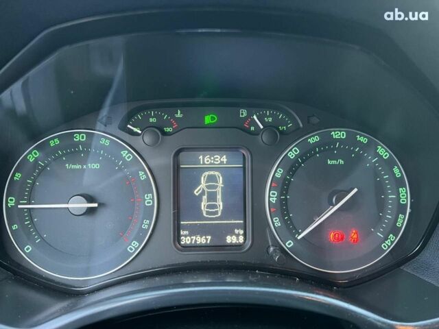 Чорний Шкода Октавія, об'ємом двигуна 2 л та пробігом 307 тис. км за 6990 $, фото 19 на Automoto.ua