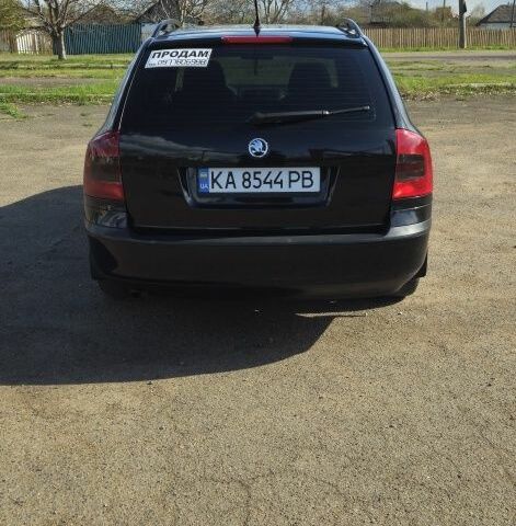 Черный Шкода Октавия, объемом двигателя 1.6 л и пробегом 252 тыс. км за 6200 $, фото 5 на Automoto.ua