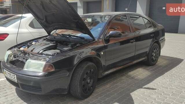 Черный Шкода Октавия, объемом двигателя 1.6 л и пробегом 279 тыс. км за 4900 $, фото 2 на Automoto.ua