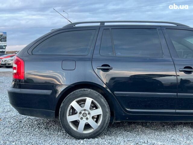 Чорний Шкода Октавія, об'ємом двигуна 2 л та пробігом 307 тис. км за 6990 $, фото 9 на Automoto.ua