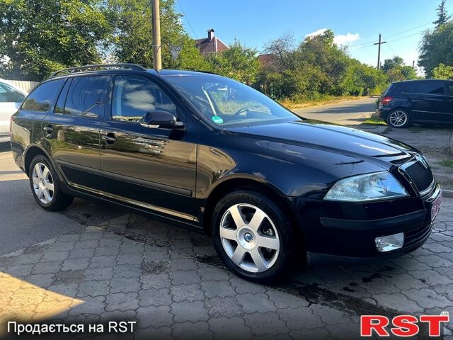 Чорний Шкода Октавія, об'ємом двигуна 2 л та пробігом 230 тис. км за 6600 $, фото 2 на Automoto.ua