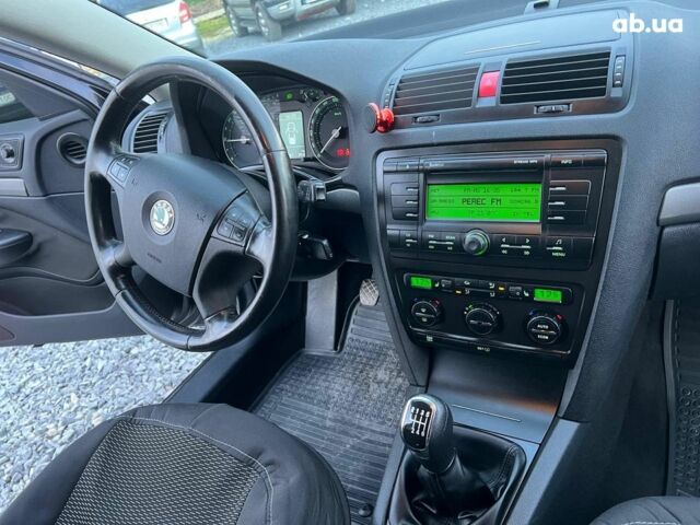 Чорний Шкода Октавія, об'ємом двигуна 2 л та пробігом 307 тис. км за 6990 $, фото 39 на Automoto.ua