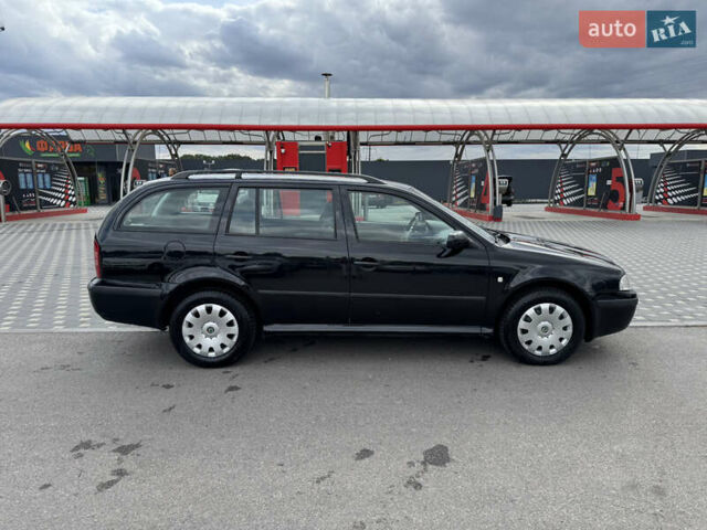Чорний Шкода Октавія, об'ємом двигуна 1.6 л та пробігом 202 тис. км за 6100 $, фото 6 на Automoto.ua