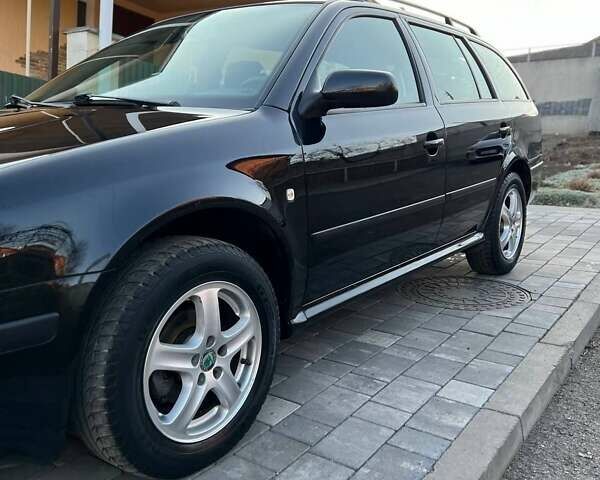 Черный Шкода Октавия, объемом двигателя 1.6 л и пробегом 189 тыс. км за 6200 $, фото 12 на Automoto.ua