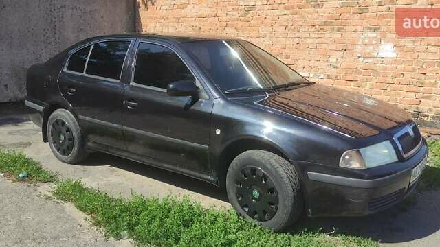 Черный Шкода Октавия, объемом двигателя 1.6 л и пробегом 279 тыс. км за 4900 $, фото 9 на Automoto.ua