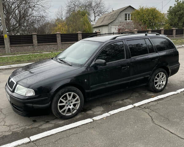 Чорний Шкода Октавія, об'ємом двигуна 1.6 л та пробігом 223 тис. км за 6300 $, фото 1 на Automoto.ua