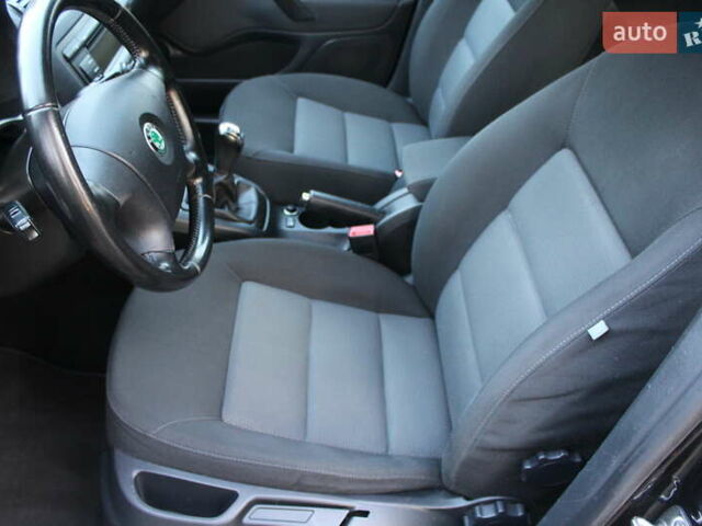 Черный Шкода Октавия, объемом двигателя 1.6 л и пробегом 215 тыс. км за 6390 $, фото 80 на Automoto.ua