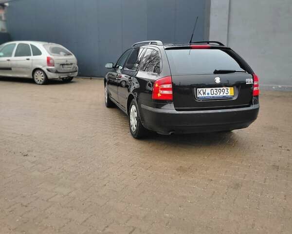 Черный Шкода Октавия, объемом двигателя 1.6 л и пробегом 217 тыс. км за 5900 $, фото 3 на Automoto.ua