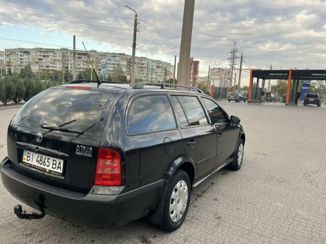 Черный Шкода Октавия, объемом двигателя 1.6 л и пробегом 270 тыс. км за 4500 $, фото 3 на Automoto.ua
