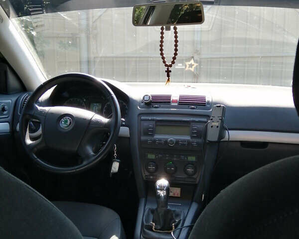 Черный Шкода Октавия, объемом двигателя 1.6 л и пробегом 173 тыс. км за 7500 $, фото 6 на Automoto.ua