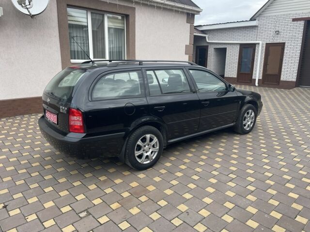 Черный Шкода Октавия, объемом двигателя 1.6 л и пробегом 201 тыс. км за 5900 $, фото 3 на Automoto.ua