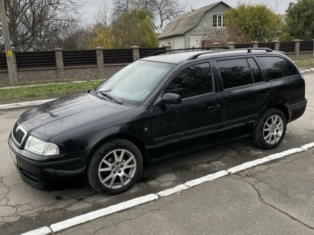 Чорний Шкода Октавія, об'ємом двигуна 1.6 л та пробігом 223 тис. км за 6300 $, фото 1 на Automoto.ua