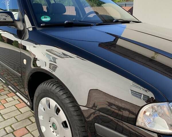 Черный Шкода Октавия, объемом двигателя 1.6 л и пробегом 200 тыс. км за 5999 $, фото 16 на Automoto.ua