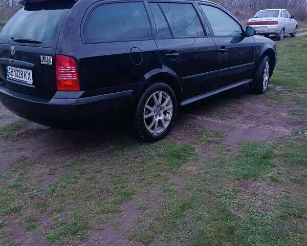 Черный Шкода Октавия, объемом двигателя 1.6 л и пробегом 193 тыс. км за 5700 $, фото 16 на Automoto.ua