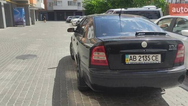Черный Шкода Октавия, объемом двигателя 1.6 л и пробегом 279 тыс. км за 4900 $, фото 5 на Automoto.ua
