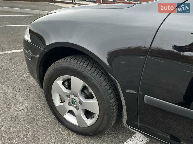 Чорний Шкода Октавія, об'ємом двигуна 1.8 л та пробігом 149 тис. км за 7399 $, фото 10 на Automoto.ua