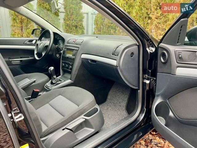 Черный Шкода Октавия, объемом двигателя 1.6 л и пробегом 198 тыс. км за 6700 $, фото 111 на Automoto.ua