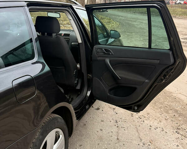 Черный Шкода Октавия, объемом двигателя 1.8 л и пробегом 197 тыс. км за 6500 $, фото 4 на Automoto.ua