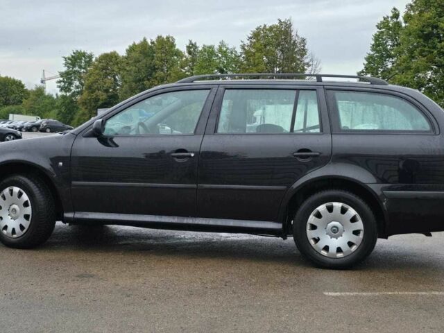 Черный Шкода Октавия, объемом двигателя 1.6 л и пробегом 238 тыс. км за 5500 $, фото 2 на Automoto.ua