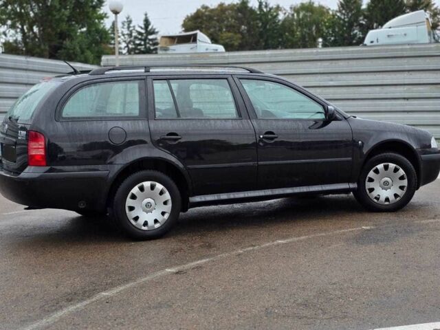 Черный Шкода Октавия, объемом двигателя 1.6 л и пробегом 238 тыс. км за 5500 $, фото 3 на Automoto.ua