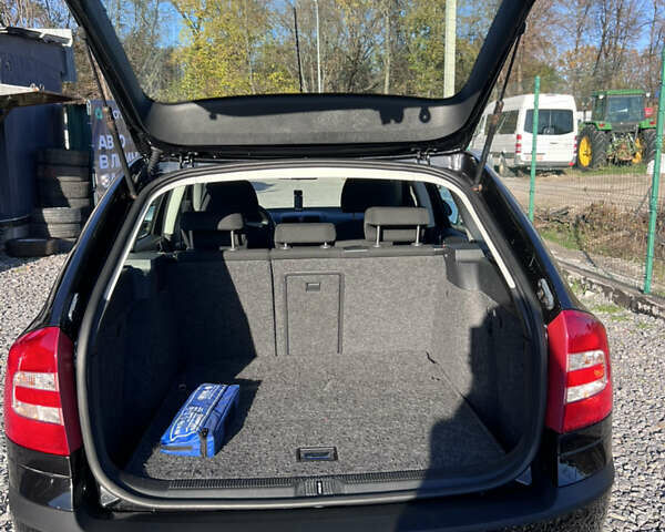 Чорний Шкода Октавія, об'ємом двигуна 1.6 л та пробігом 243 тис. км за 7499 $, фото 5 на Automoto.ua