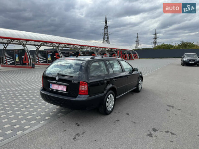 Чорний Шкода Октавія, об'ємом двигуна 1.6 л та пробігом 202 тис. км за 6100 $, фото 5 на Automoto.ua
