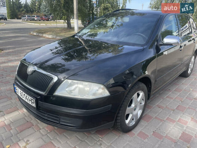 Черный Шкода Октавия, объемом двигателя 1.6 л и пробегом 247 тыс. км за 6000 $, фото 1 на Automoto.ua