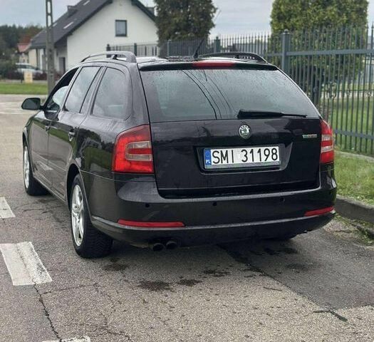 Чорний Шкода Октавія, об'ємом двигуна 2 л та пробігом 214 тис. км за 2100 $, фото 4 на Automoto.ua