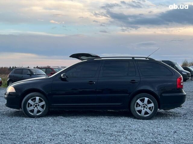 Чорний Шкода Октавія, об'ємом двигуна 2 л та пробігом 307 тис. км за 6990 $, фото 4 на Automoto.ua
