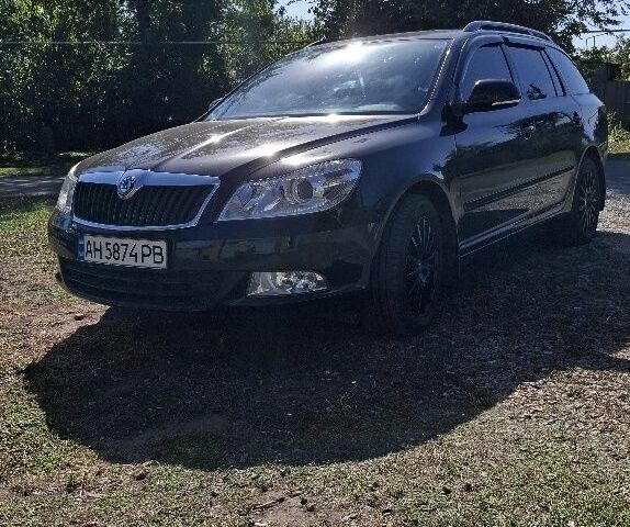 Черный Шкода Октавия, объемом двигателя 1.4 л и пробегом 100 тыс. км за 5200 $, фото 1 на Automoto.ua