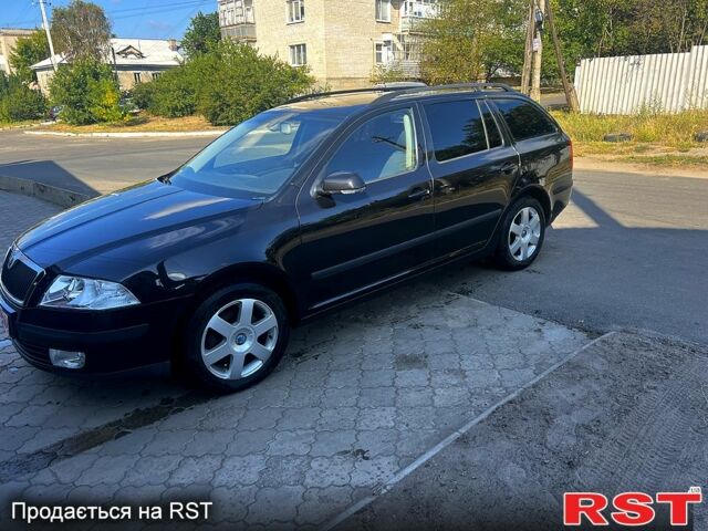 Чорний Шкода Октавія, об'ємом двигуна 2 л та пробігом 230 тис. км за 6600 $, фото 3 на Automoto.ua