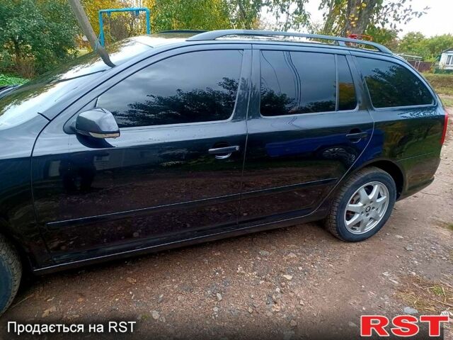Чорний Шкода Октавія, об'ємом двигуна 2 л та пробігом 259 тис. км за 7000 $, фото 2 на Automoto.ua